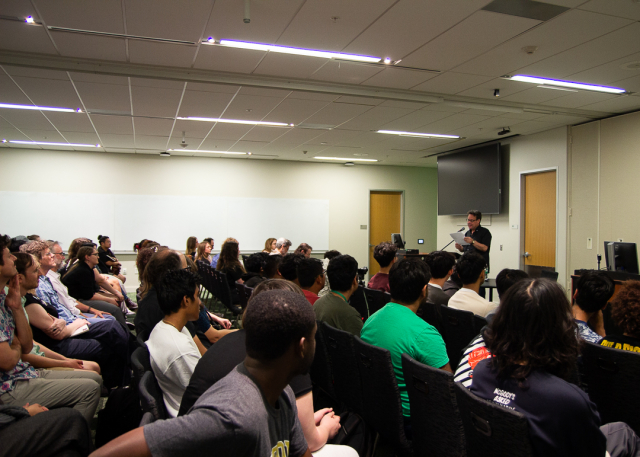 Classroom of students and faculty during awards